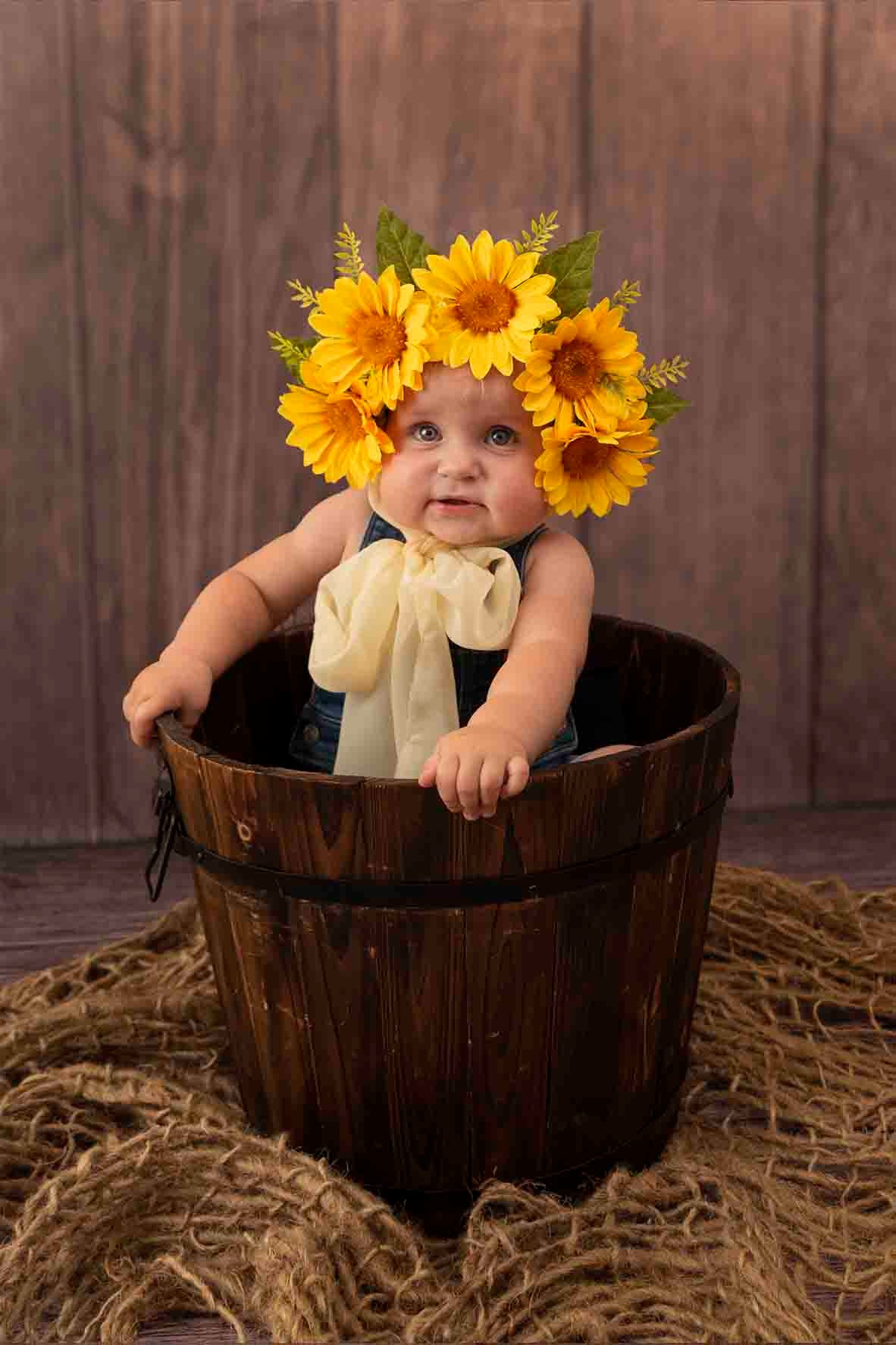 baby girl with sunflower crown