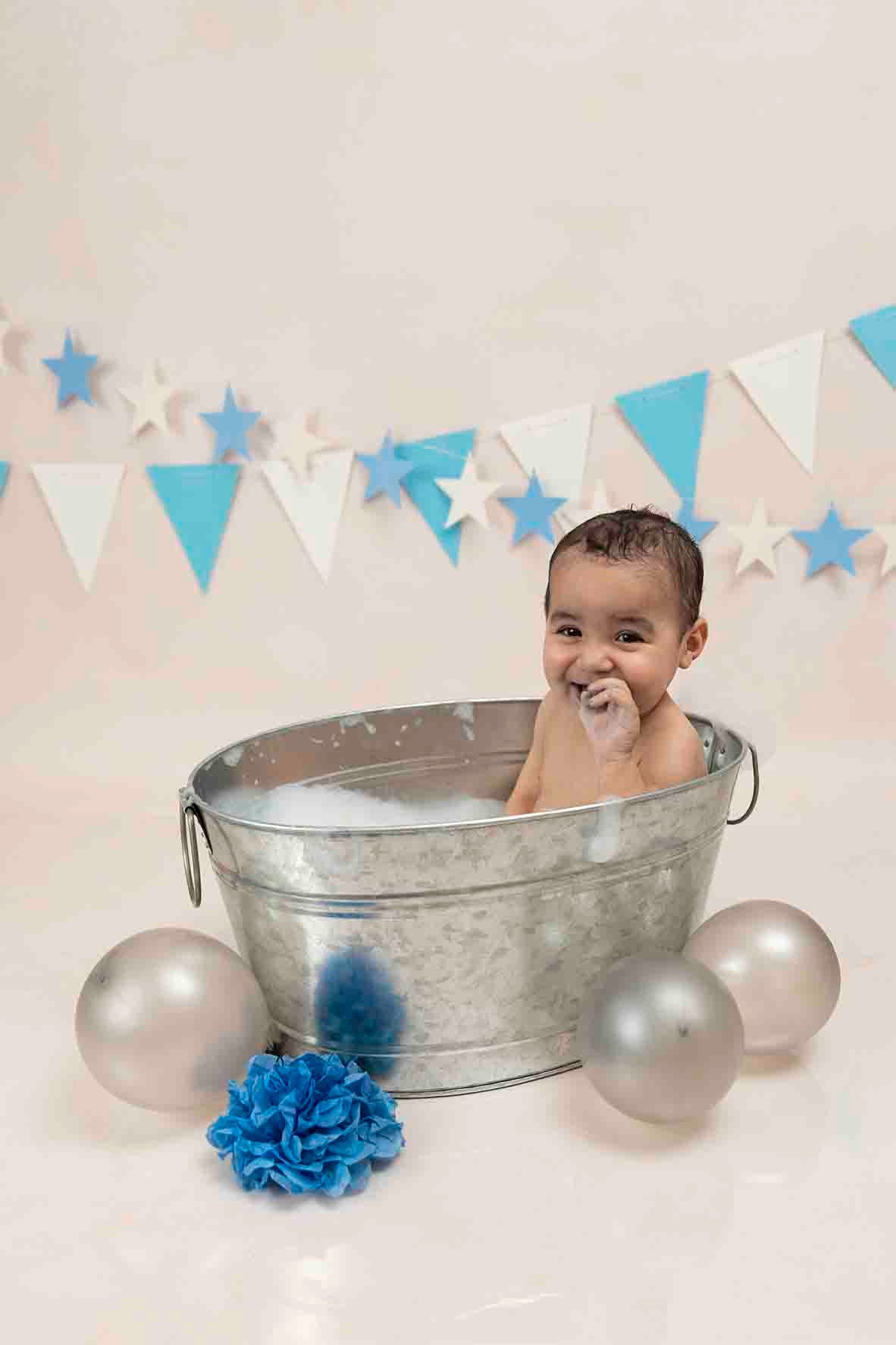 boy in bathtube for cake smash photography
