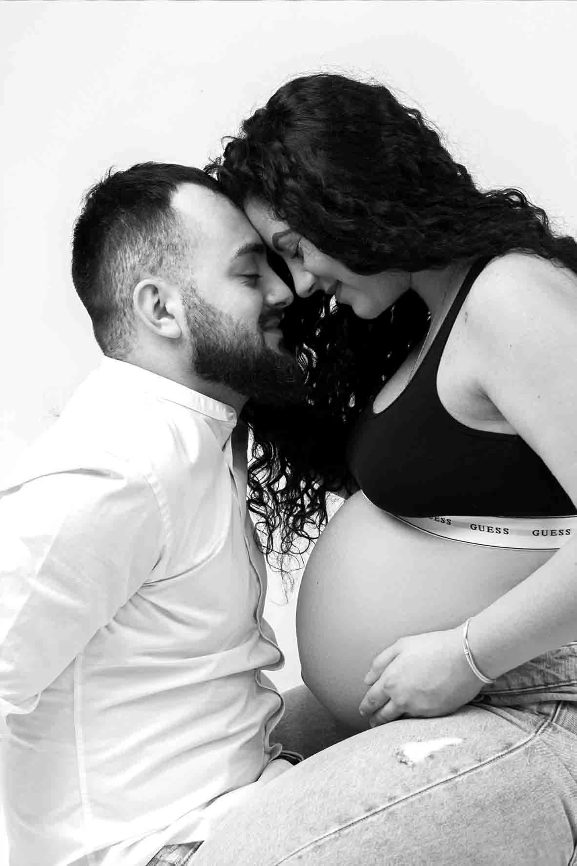 couple at studio maternity photoshoot in milton keynes