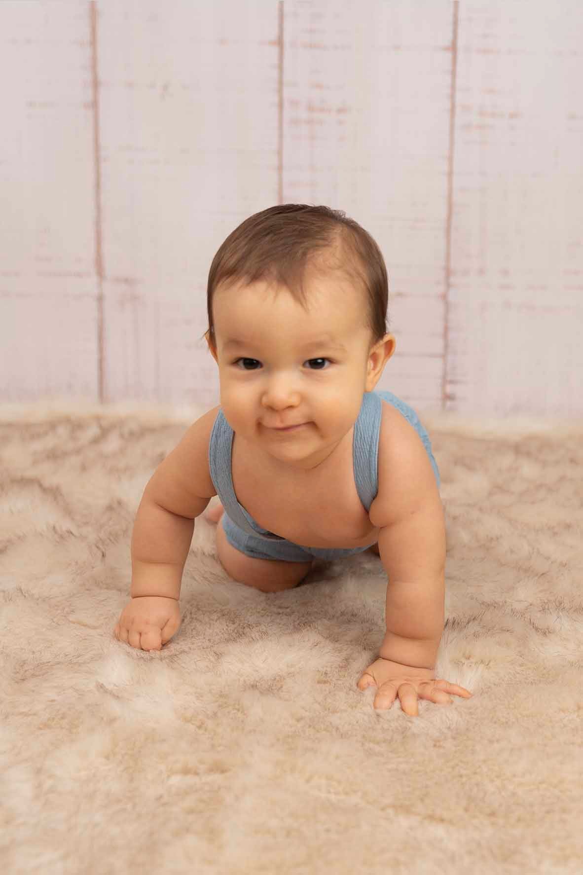 crawling baby at photoshoot